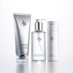 Three skincare products with a brand logo on a white background