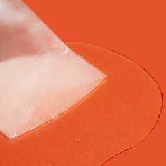 Close-up of a bandage on an orange background