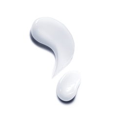 White ceramic spoon on a white background