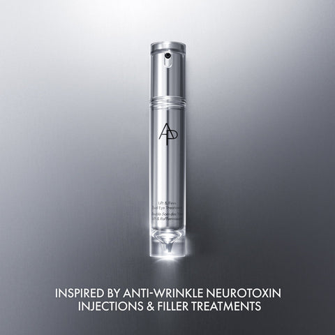 Skincare serum bottle with brand logo on a gray background