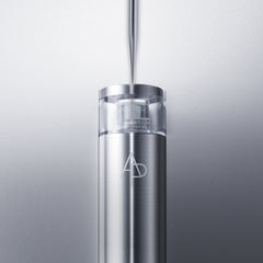 Stainless steel water bottle with a logo on a light gray background