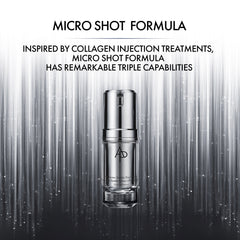 Skincare serum bottle with 'AD' branding on a black and gray striped background, featuring text about the Micro Shot Formula.