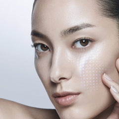 Close-up of a person's face with a soft focus on the skin texture.