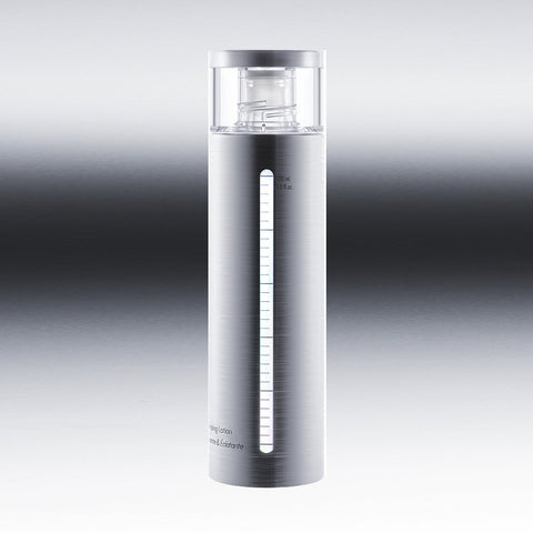 Silver skincare bottle with gradient background