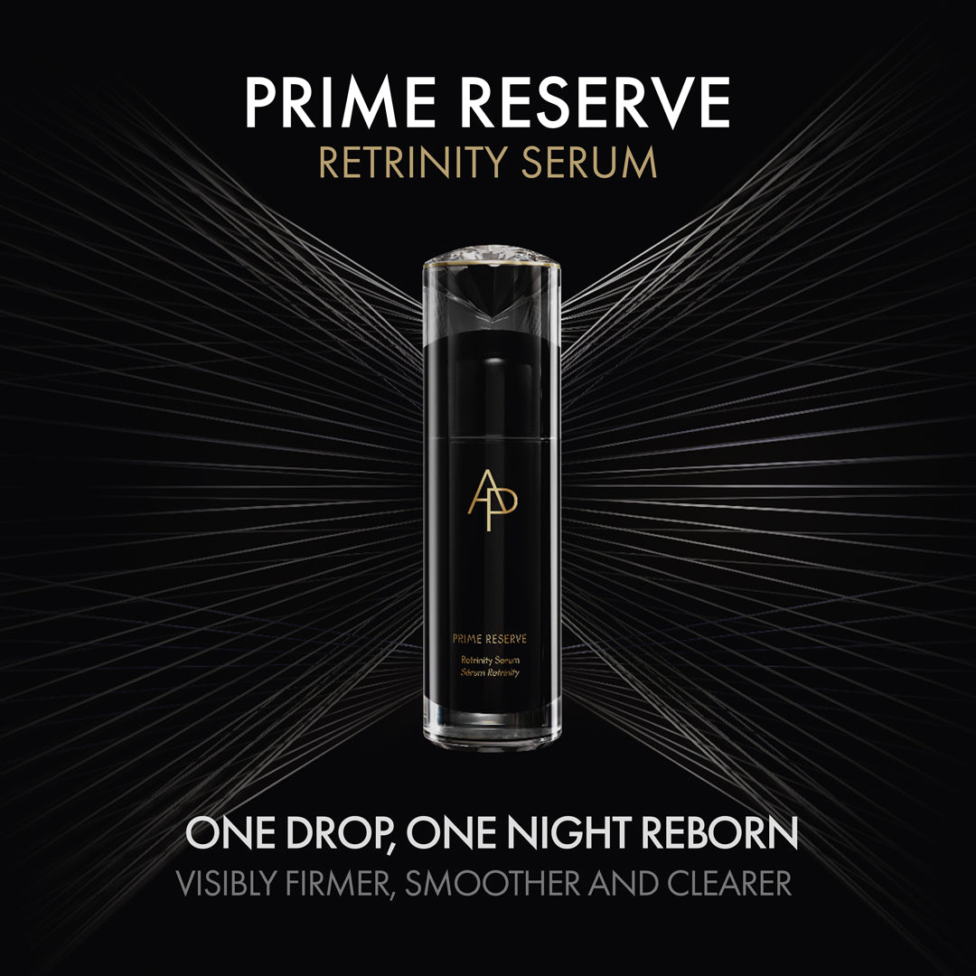 Prime Reserve Retrinity Serum bottle on a black background with gold accents