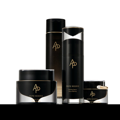 Set of black skincare products with 'AP' logo on a white background