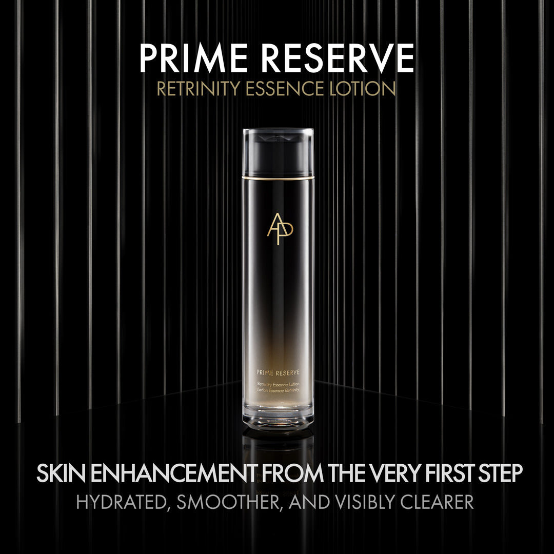 Prime Reserve Retrinity Essence Lotion bottle on a black background with text about skin enhancement.