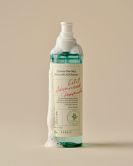 Bottle of Quinua One Step Balanced Gel Cleanser with a beige label on a beige background