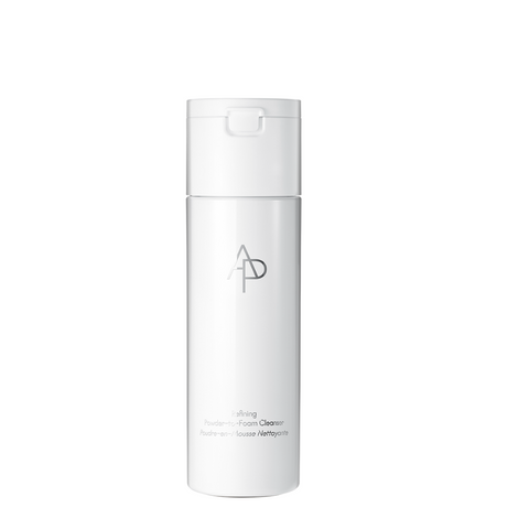 White skincare bottle with a logo on a white background