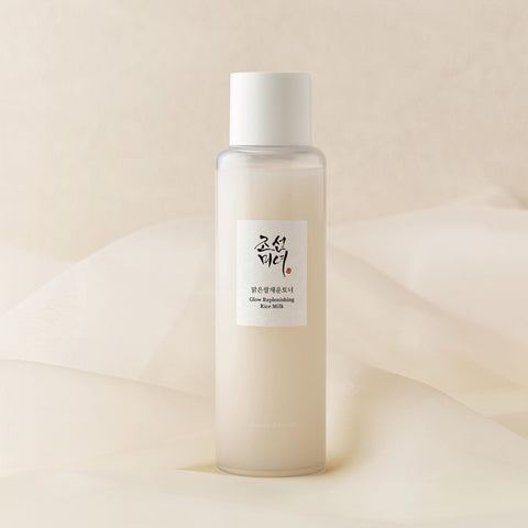 Skincare bottle with a label on a beige background