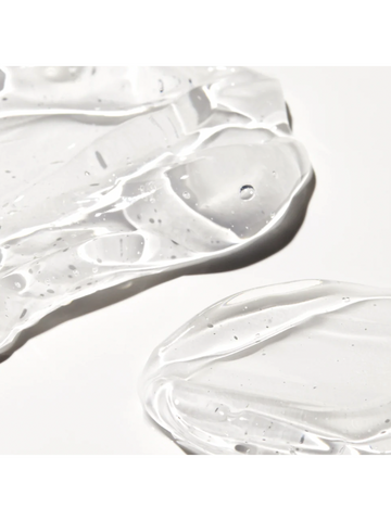 Close-up of white cream or gel on a white background