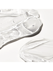 Close-up of white cream or gel on a white background