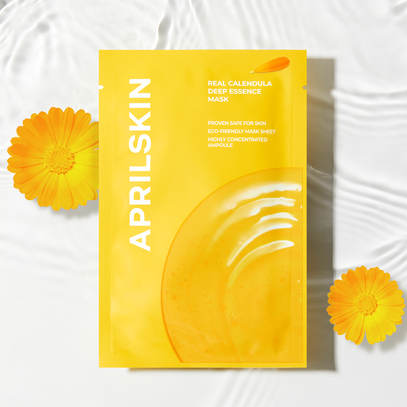Aprilskin essence mask packaging with yellow flowers on a white background