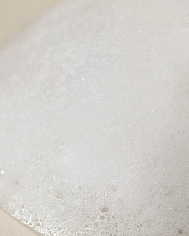 Close-up of a textured white surface with small bubbles