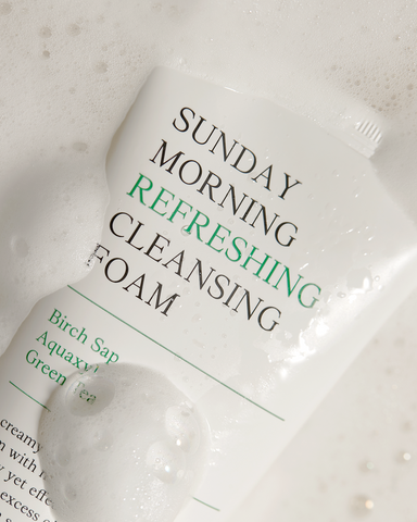 Packaging of 'Sunday Morning Refreshing Cleansing Foam' with text on a white background