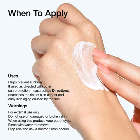 Hand applying sunscreen cream with text about usage and warnings on a white background