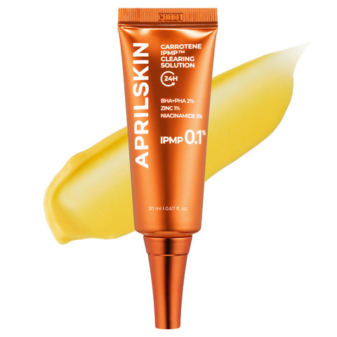 Orange skincare tube with 'AprilSkin' branding on a white background
