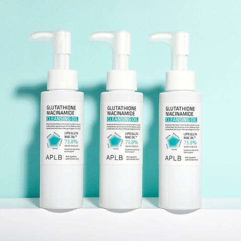 Three bottles of APLB Glutathione Niacinamide Cleanser on a light blue background