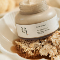 Beauty of Joseon Ground Rice and Honey Glow Mask with natural ingredients on a textured surface