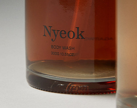 Nyeok body wash bottle with label on a white background
