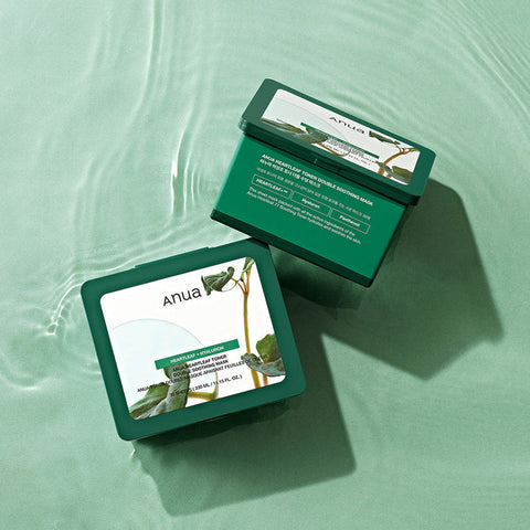 Two green boxes with product labels on a green background