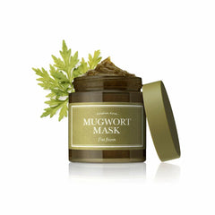 Mugwort mask jar with leaves on a white background